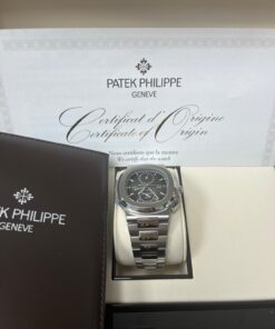 Alternative view of Patek Philippe Nautilus Travel Time Chronograph/ Stainless Steel/ Black Graduated Dial (Ref# 5990/1A-001)